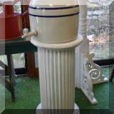 D43. Pedestal and water jug.